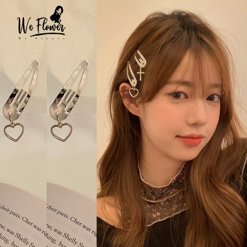Set 2 kẹp tóc WE FLOWER kim loại màu bạc đính trái tim rỗng thời trang dành cho nữ