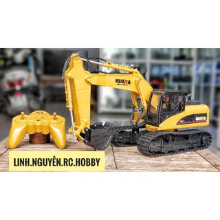 Xe xúc điều khiển từ xa tỉ lệ 1/14 bánh xích. gàu xúc bằng kim loại. body nhựa. cử động nhiều khớp.