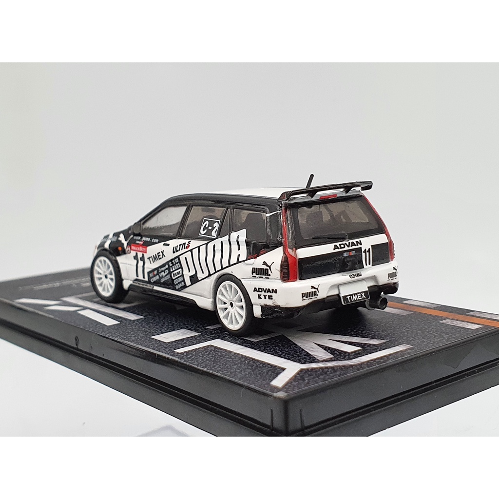 Xe Mô Hình Mitsubishi Lancer Evolution Wagon 1:64 Tarmac Works ( Trắng Đen )