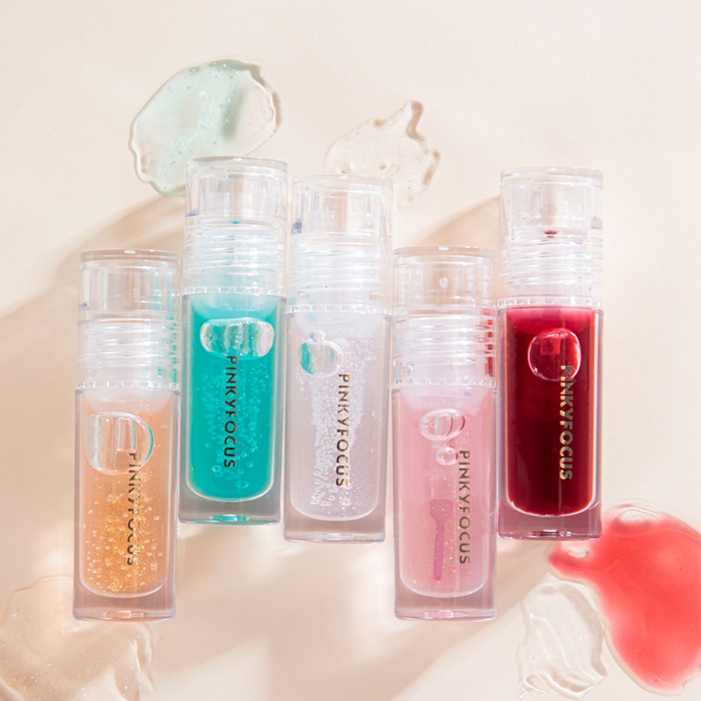 The Ultimate Lip Nourishment Lip Oil Transparent Lip Dew dành cho đôi môi dưỡng ẩm không màu, trang điểm cao cấp Châu Âu và Mỹ