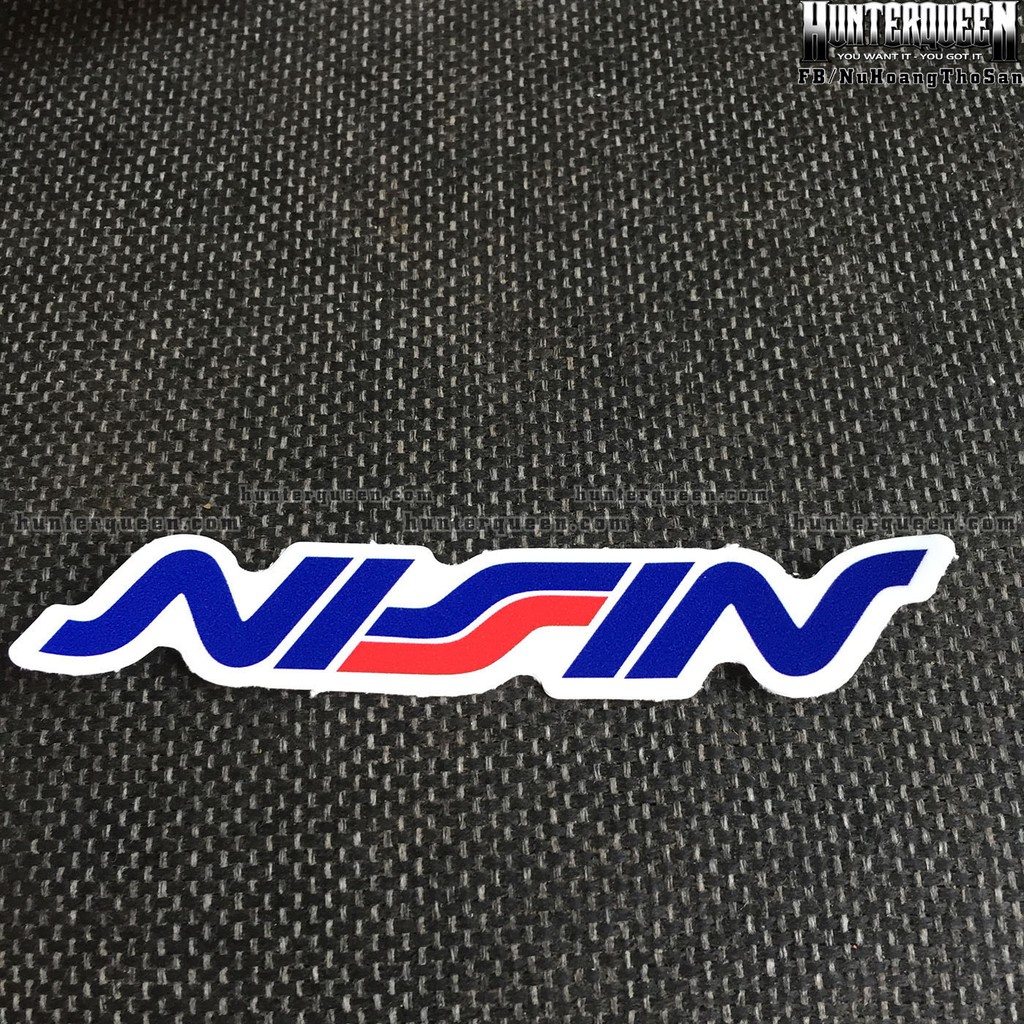 NISSIN[11.2x2cm] decal cao cấp chống nước, sắc nét, bền màu, dính chặt. Hình dán logo trang trí mọi nơi, in theo yêu cầu