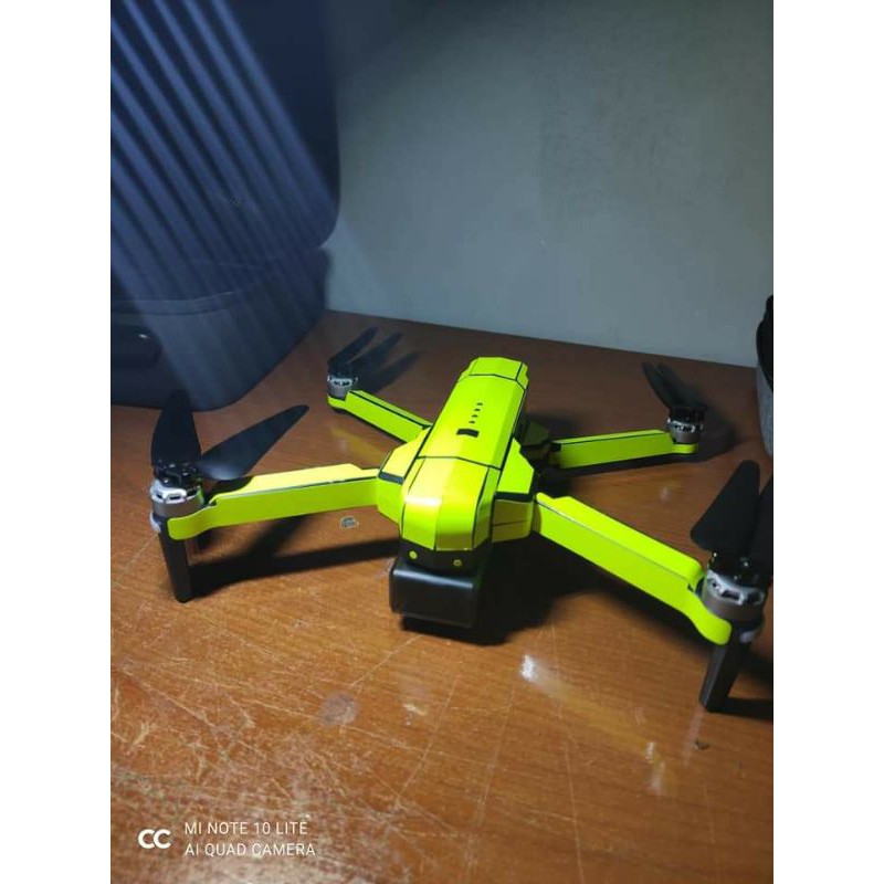 Skin Bảo Vệ Trang Trí Flycam Sjrc F11s 4K Pro Xanh Dạ Quang - Full Body - Decal Cao Cấp - Dán 2 Pin
