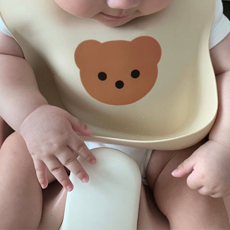 Yếm Ăn Silicone Cấp Thực Phẩm Chống Nước In Hình Gấu Có Túi Điều Chỉnh Được Dành Cho Trẻ Sơ Sinh