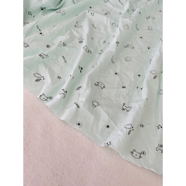 Vải thun cotton 2c hình baby nền xanh ngọc nhạt