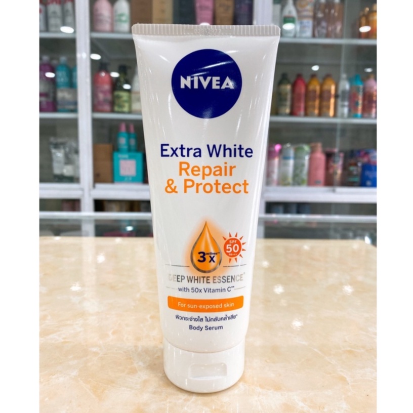 Dưỡng thể chống nắng Nivea Extra White Repair &amp; Protect Serum SPF50 - sữa dưỡng thể nivea ban ngày