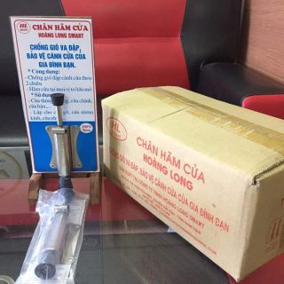 Chân hãm cửa hoàng long smart