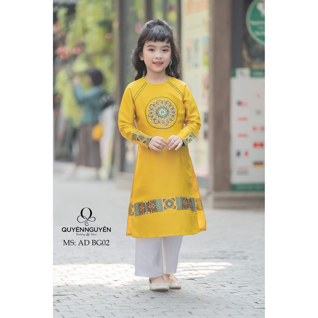 áo dài bé gái vàng thổ cẩm (ADBG 02)