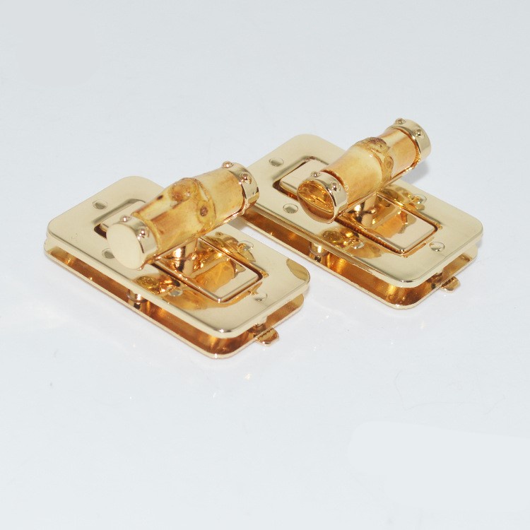 K167 - Khóa túi xách, khóa trúc vặn