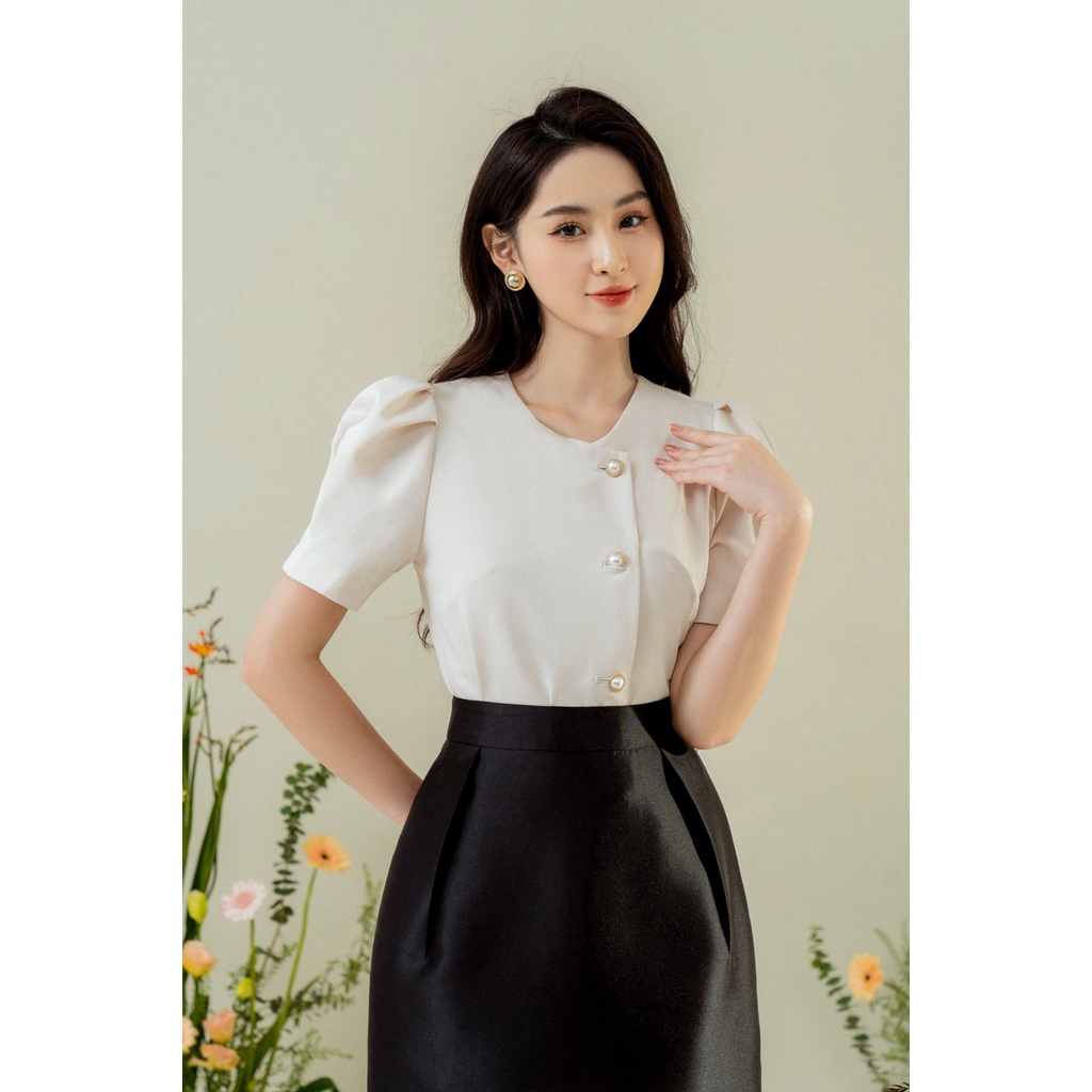 Áo cổ tròn tay bồng cúc lệch TIINSTORE AHN367