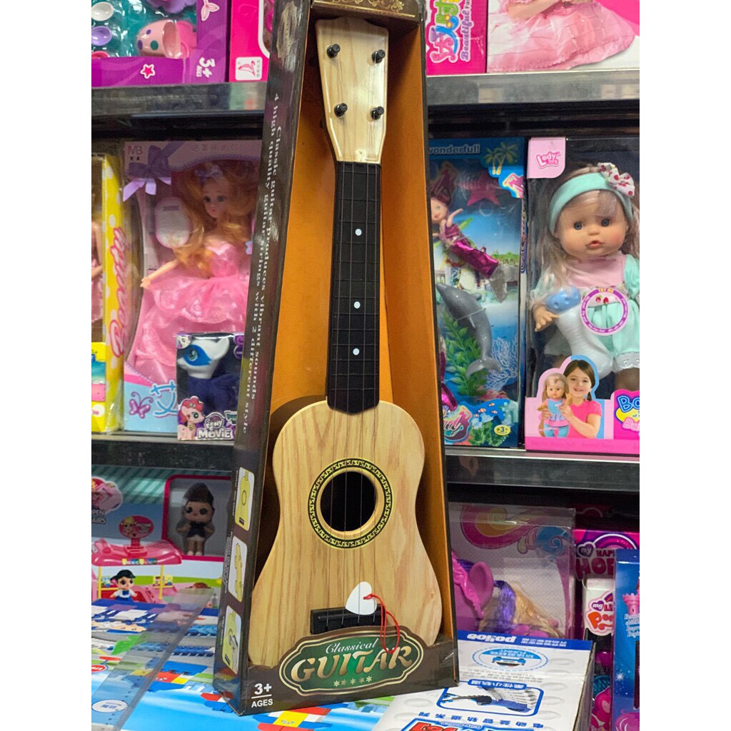 siêu hót Đàn Ukulele Nhựa Cho Bé - Đàn Ghi Ta Mini DTE