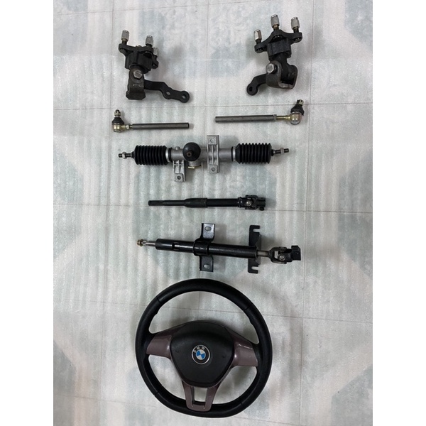 Hệ thống lái vô lăng xe 4 bánh,mai ơ tim ốc đo vuông 7cm,chéo 10cm,dùng chế xe 4 bánh lái vô lăng