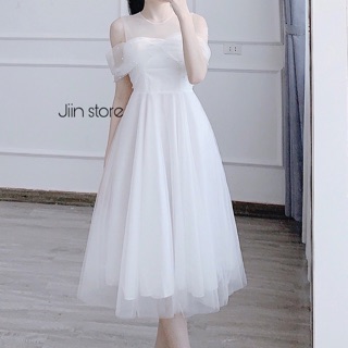 Váy trễ xoắn nơ