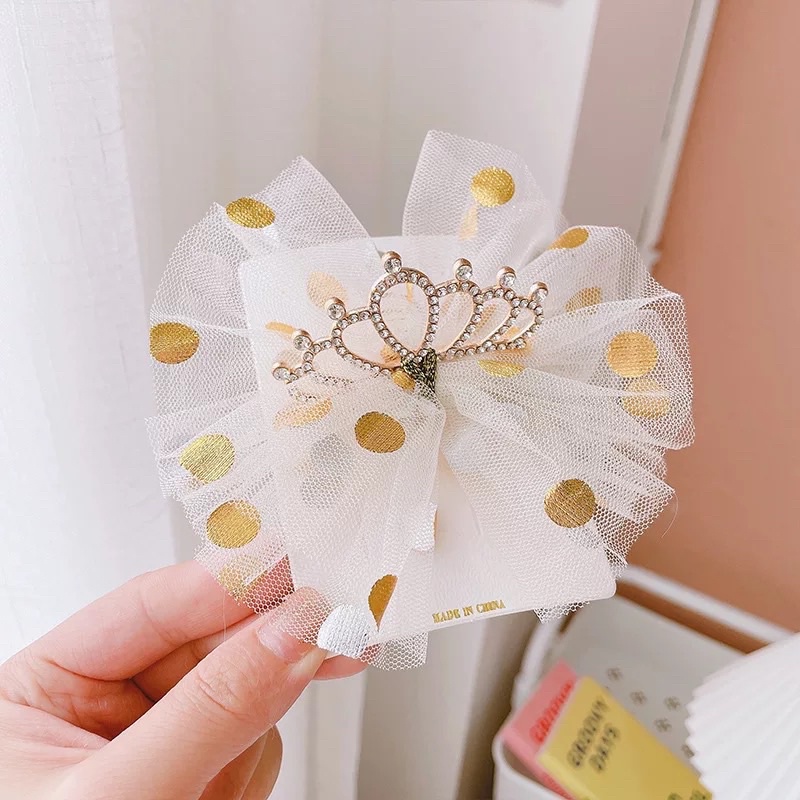 Kẹp tóc nơ tone vàng xinh xắn cho bé