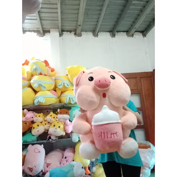 Gấu bông heo ôm bình sữa, gấu bông heo cầm bình sữa khủng lồ