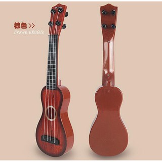 Đàn guitar giả gỗ cho bé