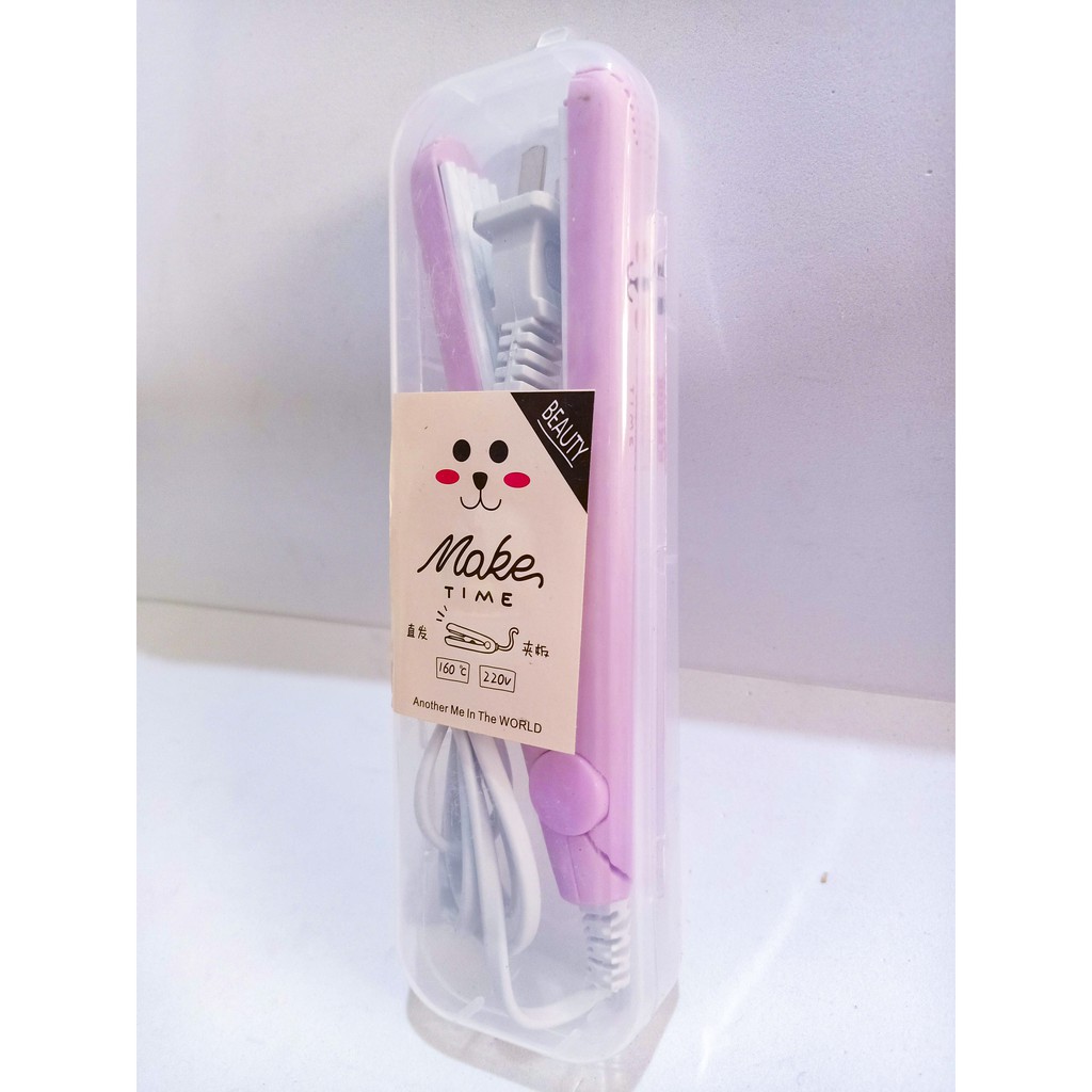 Máy dập xù tóc mini kèm hộp đựng máy uốn tóc máy là tóc