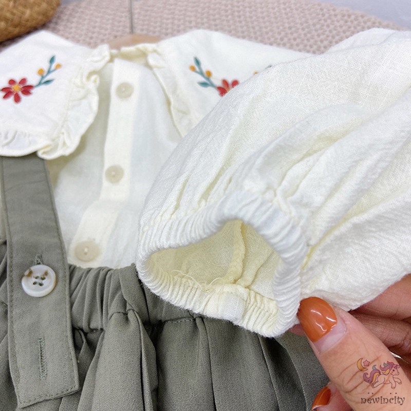 Set áo sơ mi tay dài thêu họa tiết + đầm yếm thời trang cho bé gái