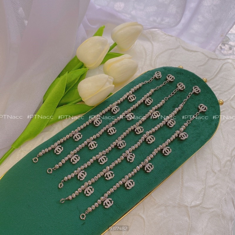 Lắc tay bi xi 2 màu trắng, vàng charm logo X, lắc bi charm thương hiệu sang trọng .PTNACC.