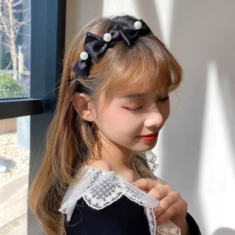 cài nơ xinh xắn màu đen