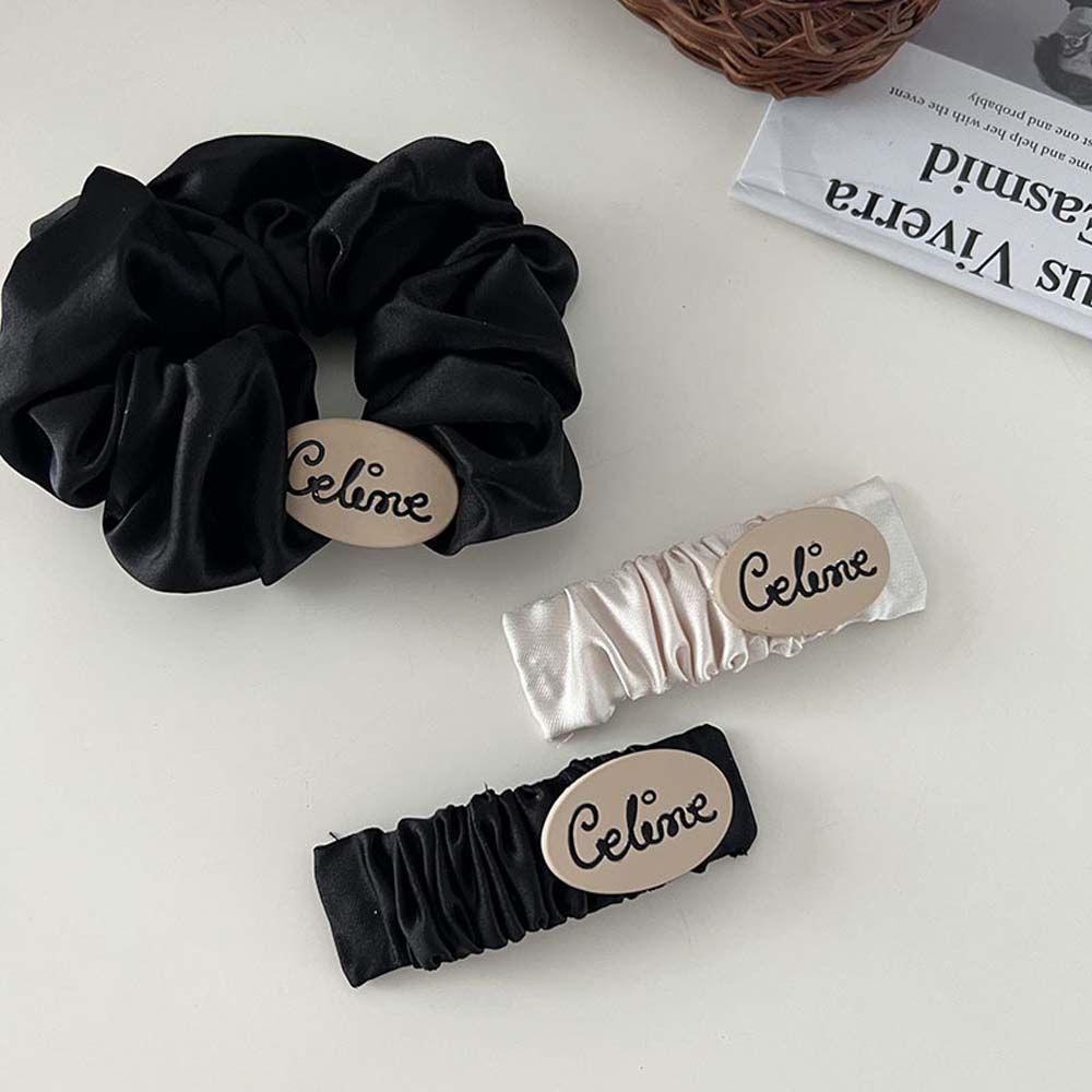 Dây Buộc Tóc Vải Lụa Satin Màu Trắng In Chữ VANES1
