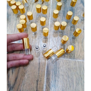5lọ thủy tinh 1ml bi lăn thép Nắp Nhôm dài vàng ánh kim sang trọng dễ thương chiết tinh dầu dubai mẫu thử tặng khách