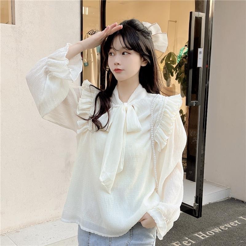 Áo  sơ mi   điệu  bánh bèo - tiểu thư chất vải  tơ hàng quảng châu  loại 1 - Màu be trắng .