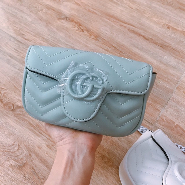 Túi mẫu xinh .dập.lót đỏ .dây đeo cùng màu túi