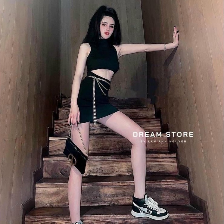 Đầm sát nách ôm body khoét eo dây xích cực hot , chất thun bozip mềm mịn