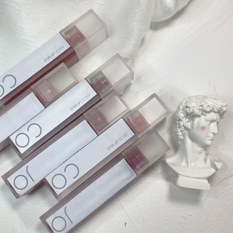 Son Môi Bùn Dạng Ống Màu Trắng Dâu Tây Trong Suốt Có Vỏ Màu Trắng