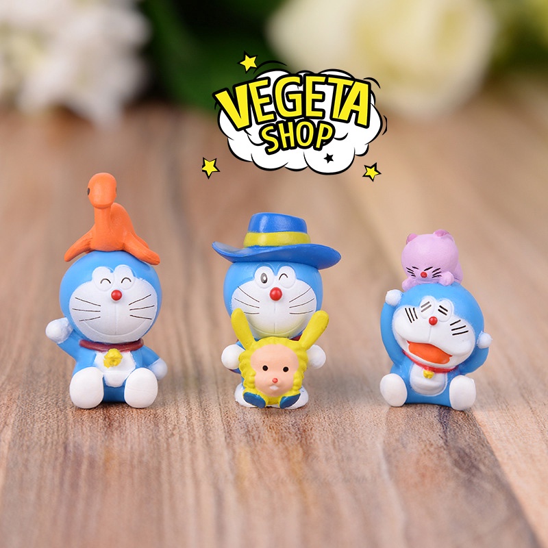 Mô hình Doraemon Doremon - Trọn bộ 8 Mô hình mô phỏng các tập truyện dài trong Doraemon - Cao 3~4cm