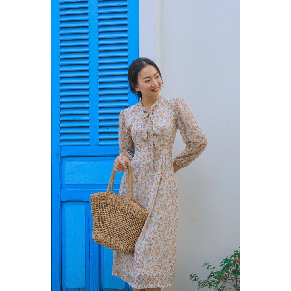 Đầm cột nơ cổ vintage dáng xòe dài qua gối