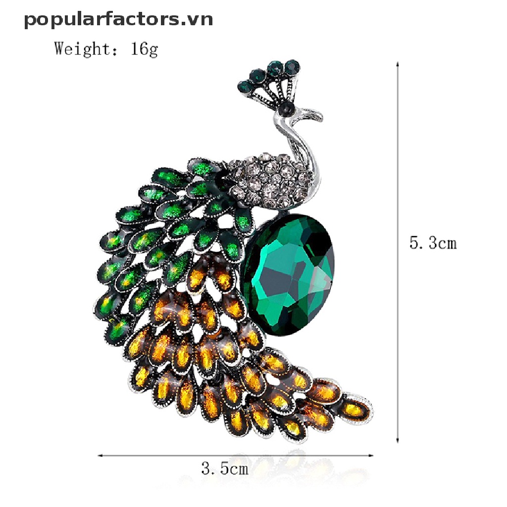 Ghim cài áo hình con công phong cách Giáng sinh đính hạt đá