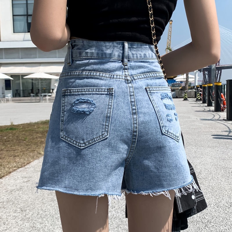 Quần short jean hình chữ A cạp cao ống rộng phối rách phong cách mùa hè Hàn 2021 mới cho nữ