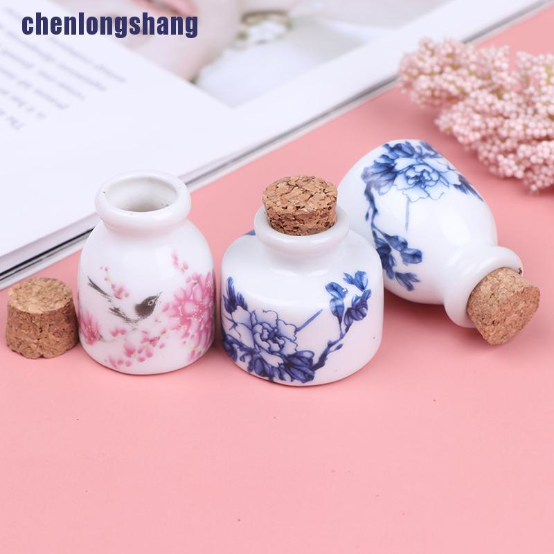 Chai bằng gốm sứ thủy tinh để đựng chất lỏng có nút bần bằng gỗ tiện dụng