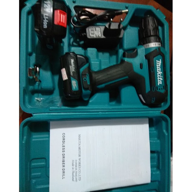 Máy khoan pin 12 vôn DF331D Makita Thái lan-chữ makita đúc nổi- pin to loại chân cài 1.5AH