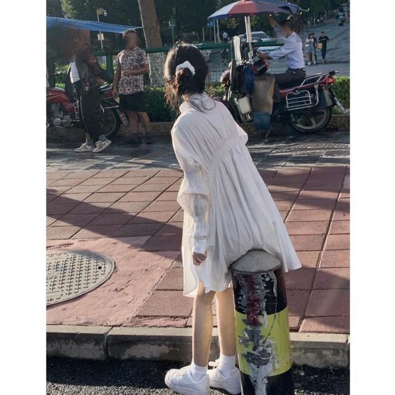Đầm babydoll trắng dài tay xinh xắn