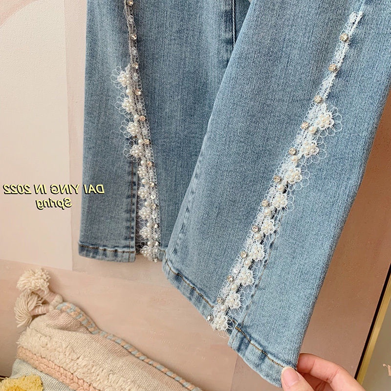 Quần Jeans Nữ Lưng Cao Ống Loe Xẻ Tà  tao bao