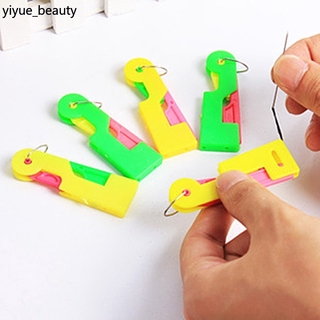 Dụng cụ xỏ kim tự động