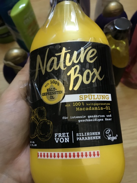 Dầu gội và dầu xả Nature box chiết xuất hạt Mắc ca cung cấp dưỡng chất giúp tóc óng mượt tự nhiên