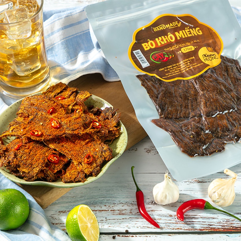 Bò khô miếng vị cay đặc biệt Xuân Hương nguyên chất thịt bò khô tươi thơm ngon đậm đà đồ ăn vặt Nonglamfood | BigBuy360 - bigbuy360.vn