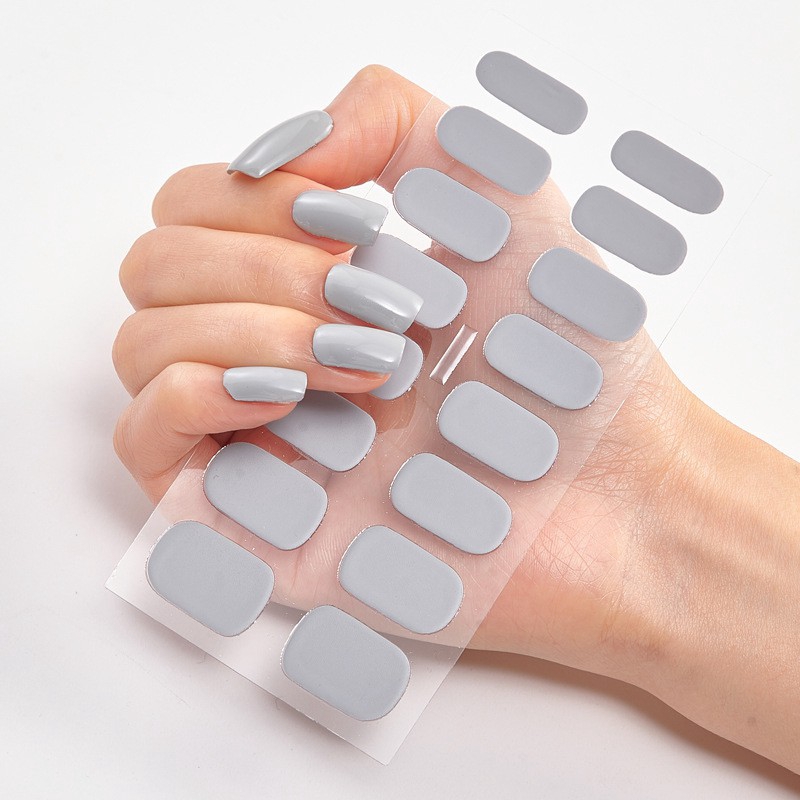 Tờ giấy gồm 16 miếng dán trang trí móng tay xinh xắn