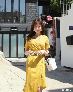 Đầm vàng cột eo