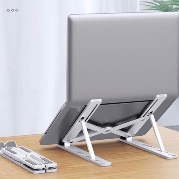 Giá đỡ laptop,giá đỡ nhôm siêu chắc,đa năng,có thể gập ra vào,chỉnh lên xuống theo ý thích,chịu được lực rất tốt,ổn đinh