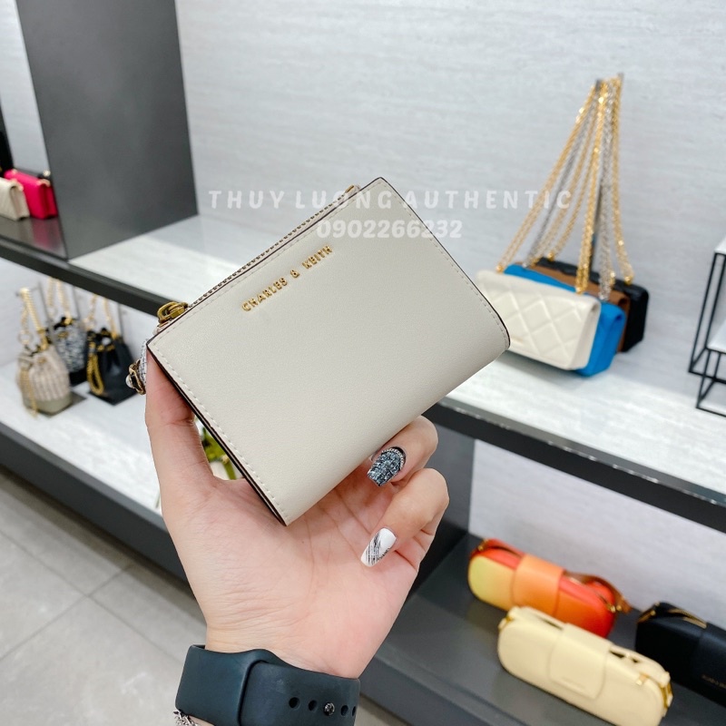 Ví nữ Charles and Keith màu cam, nâu, kem