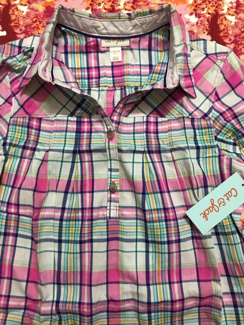 Áo sơ mi xuất dư