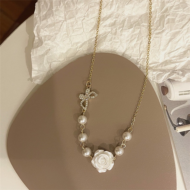 Vòng cổ choker hạt trai mặt hoa hồng và cánh bướm VC009 Leous Accessories