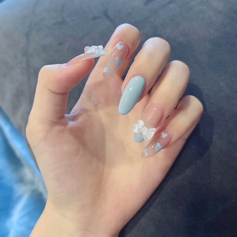 Bộ dán móng tay giả đính nơ trắng trai tim màu xanh Z80