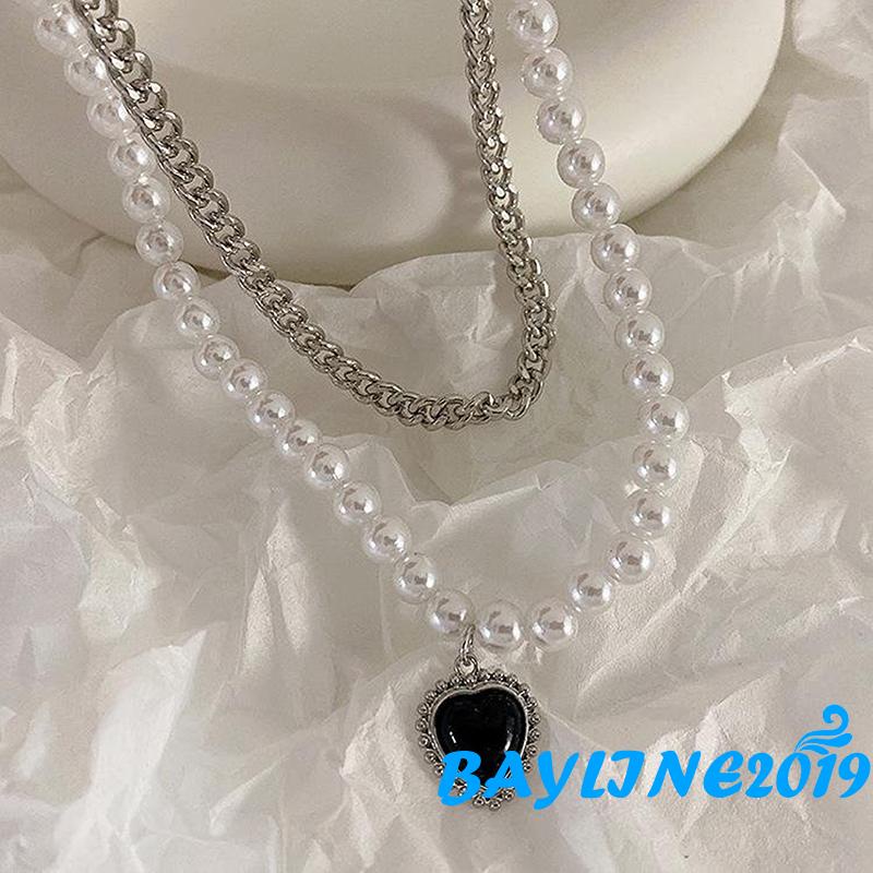 Vòng cổ Kim Loại Màu Đen Mặt Trái Tim Đính Đá Và Ngọc Trai Giả