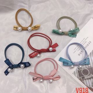 Cột tóc nơ kèm hạt trai giả