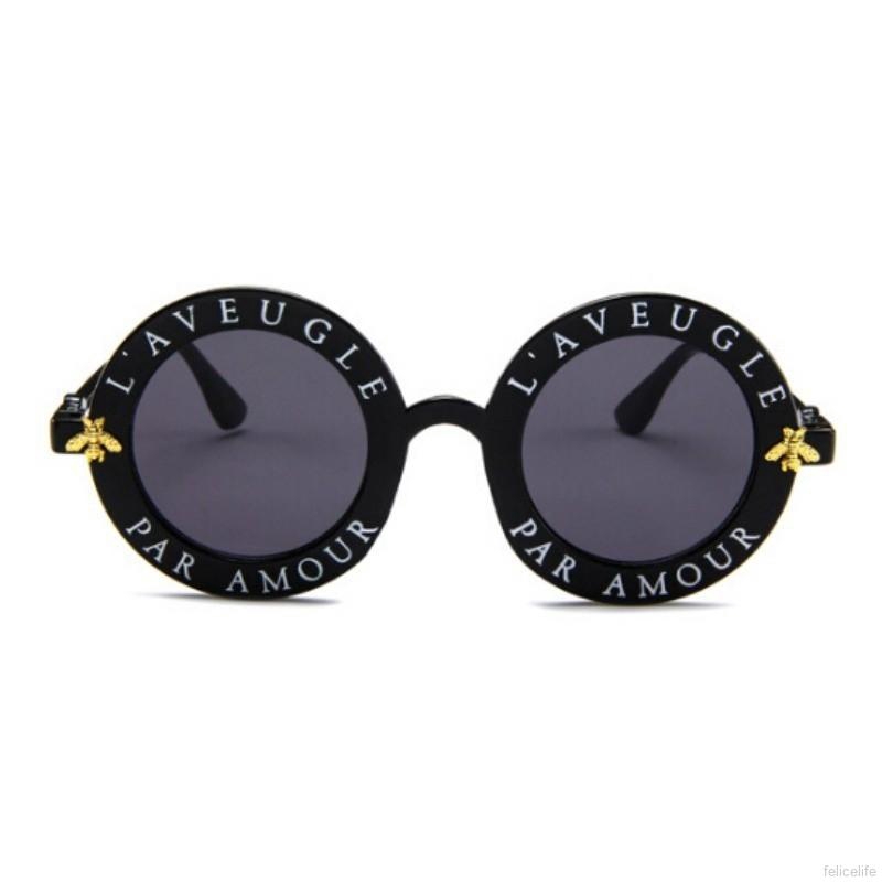 Kính mát gọng tròn khắc chữ độc lạ thời trang